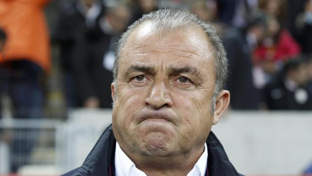 Galatasaray&#039;s coach Fatih Terim reacts before the start of their Champions League quarter-final second leg soccer match against Real Madrid in Istanbul April 9, 2013. REUTERS/Osman Orsal (TURKEY - Tags: SPORT SOCCER)
