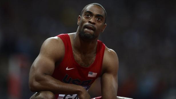 Tyson Gay of the U.S. reacts after finishing fourth in the men&#039;s 100m final during the London 2012 Olympic Games at the Olympic Stadium in this August 5, 2012 file photo. U.S. 100 metres record holder Tyson Gay said on July 14, 2013 he had tested positive for a substance he could not identify and was pulling out of next month&#039;s world championships. REUTERS/Dylan Martinez/Files (BRITAIN - Tags: SPORT OLYMPICS ATHLETICS)
