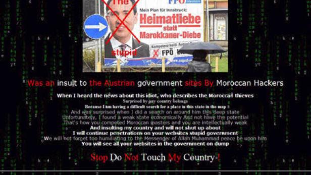 Eine gehackte Webseite mit einem FPOE-Plakat, das mit roter Farbe beschmiert wurde.