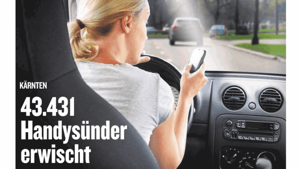 Eine Frau telefoniert während der Fahrt mit dem Handy.