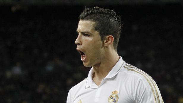 REUTERSReal Madrids Cristiano Ronaldo celebrates after scoring their second goal against Barcelona during their Spanish first division "El Clasico" soccer match at Nou Camp stadium in Barcelona April 21, 2012. REUTERS/Juan Medina (SPAIN - Tags: SPORT Real gewinnt "El Clásico" bei Barça