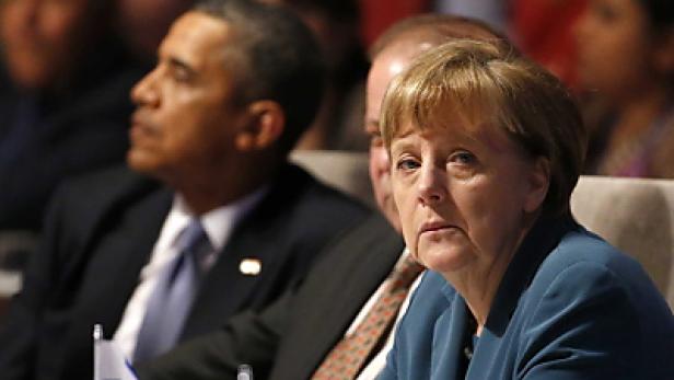Merkel mit Obama in Den Haag Obama und Merkel fordern Waffenruhe