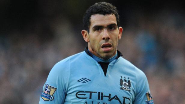 epa03525092 Manchester City&#039;s Carlos Tevez reacts during English FA Cup 3rd round soccer match Manchester City vs Watford at the Etihad Stadium, Manchester, Britain, 05 January 2013. EPA/PETER POWELL DataCo terms and conditions apply. http//www.epa.eu/downloads/DataCo-TCs.pdf