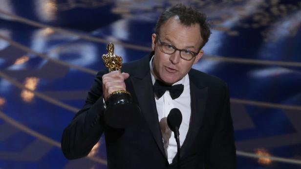 Director Tom McCarthy accepts the award for Best O
