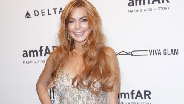 Actress Lindsey Lohan attends the amfAR New York G