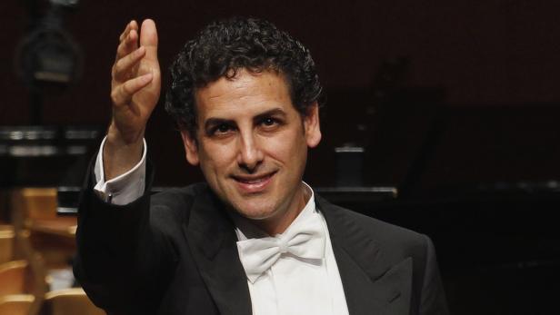 Peruvian tenor Juan Diego Florez waves at the audi