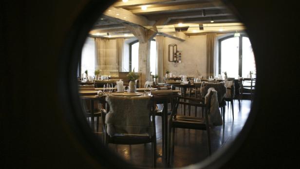 The interior of Rene Redzepi&#039;s Noma restaurant is seen through a window in Copenhagen December 12, 2009. When Redzepi started Noma restaurant -- the name comes from the Danish words for Nordic and food -- six years ago, it was derided by locals, who thought it would be a flash-in-the-pan and joked about cooking gourmet whale blubber and seals. Instead, he has soared through the rankings of Restaurant magazine&#039;s list of the World&#039;s 50 Best Restaurants to secure third place behind contemporary legends El Bulli and The Fat Duck -- and Redzepi himself was this year voted &quot;Chef&#039;s chef&quot; by those who run the other 49 top eateries. Picture taken December 12, 2009. To match Reuters Life! DENMARK-FOOD/CHEF REUTERS/Christian Charisius (DENMARK - Tags: SOCIETY FOOD)