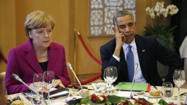 Barack Obama and Angela Merkel hätten im Moment Gesprächsbedarf - derzeit wird aber noch geschwiegen.