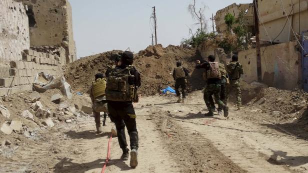 Irakische Einheiten auf der Suche nach IS-Kämpfern – deren Einfluss nimmt im Zweistromland ab.