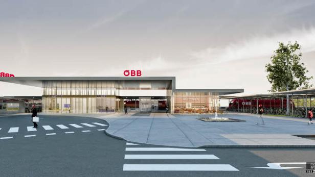 Eine Ansicht des modernen ÖBB-Bahnhofs mit Personen und Fahrrädern.