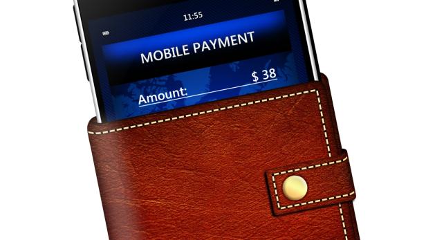 So wird es zwar nicht ganz aussehen, aber: NFC-taugliche Smartphones könnten künftig auch zum Bezahlen an den Kassen verwendet werden.