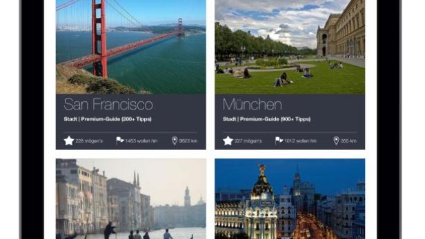Ein iPad zeigt die Tripwolf Guides App mit Vorschlägen für San Francisco, München, Venedig und Madrid.