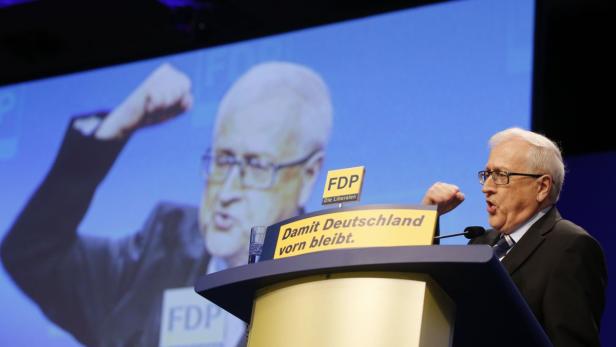 Faction leader of the liberal Free Democratic Party (FDP) Rainer Bruederle addresses a two-day party convention in Berlin March 10, 2013. REUTERS/Tobias Schwarz (GERMANY - Tags: POLITICS)