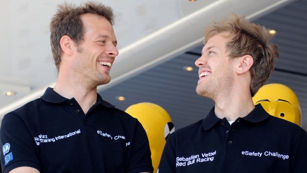 Alexander Wurz im Gespräch mit Sebastian Vettel.