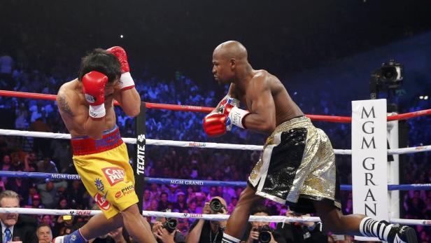 Floyd Mayweather und Manny Pacquiao während eines Boxkampfes.