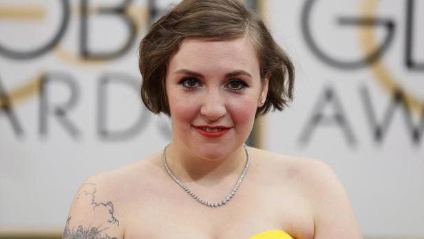 Lena Dunham arrives at the 71st annual Golden Glob Actress Lena Dunham arrives at the 71st annual Golden Globe Awards in Beverly Hills, California January 12, 2014. REUTERS/Danny Moloshok (UNITED STATES - Tags: Entertainment)(GOLDENGLOBES-ARRIVALS)