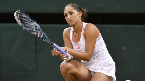REUTERSTamira Paszek of Austria reacts during her womens quarter-final tennis match against Victoria Azarenka of Belarus at the Wimbledon tennis championships in London July 3, 2012. REUTERS/Toby Melville (BRITAIN - Tags: SPORT TENNIS) Paszek nach großem Kampf out