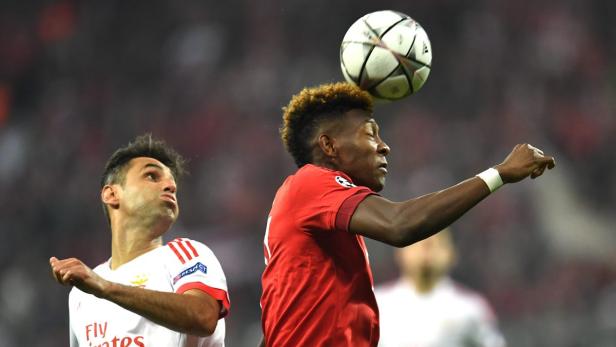epa05245563 Bayern&#039;s David Alaba (R) in action against Benfica&#039;s Jonas during the UEFA Champions League quarter final first leg match between Bayern Munich and Benfica Lisbon at Allianz Arena in Munich, Germany, 05 April 2016. EPA/ANDREAS GEBERT