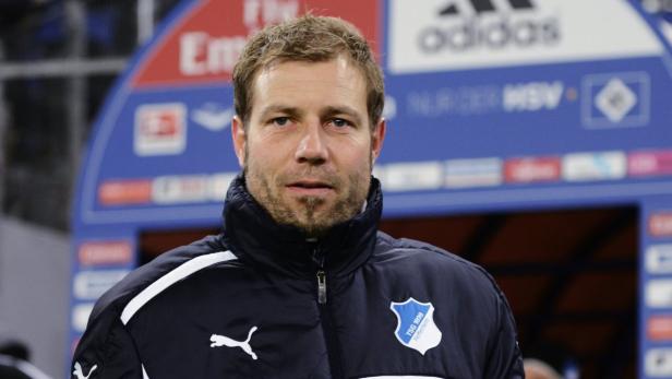 TSG 1899 Hoffenheim&#039;s new interim coach Frank Kramer is pictured before the German Bundesliga first division soccer match against Hamburger SV in Hamburg, December 7, 2012. REUTERS/Fabian Bimmer (GERMANY - Tags: SPORT SOCCER) DFL RULES TO LIMIT THE ONLINE USAGE DURING MATCH TIME TO 15 PICTURES PER GAME. IMAGE SEQUENCES TO SIMULATE VIDEO IS NOT ALLOWED AT ANY TIME. FOR FURTHER QUERIES PLEASE CONTACT DFL DIRECTLY AT + 49 69 650050