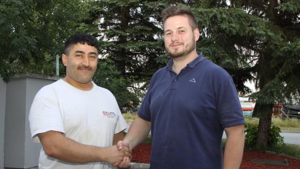 Murat Sensoy (links) wurde Gemeindewohnung verwehrt; Sein Chef Georg Punz half bei der Suche nach einer neuen Bleibe für Sensoy und seine Familie