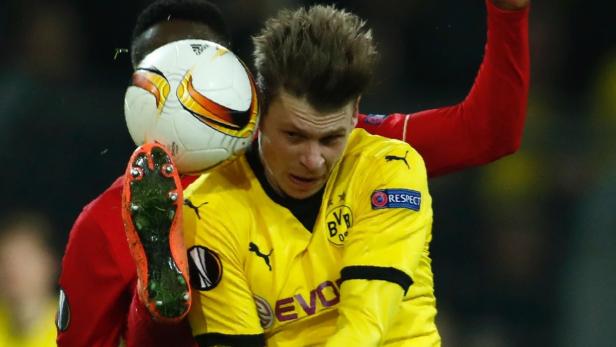 Heißer Tanz: Dortmunds Lukasz Piszczek (rechts) und Liverpools Divock Origi kämpften letzte Woche um jeden Zentimeter.