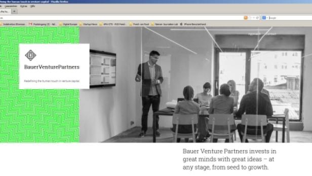 Die Webseite von Bauer Venture Partners zeigt ein Meeting in einem modernen Büro.