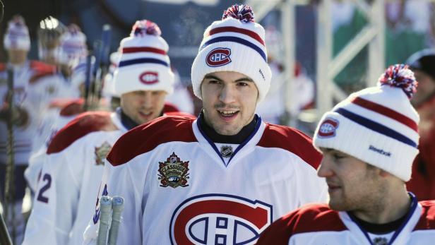 Montreal Canadiens&#039; Alexandre Picard walks to the ice with his teammates during their practice at the outdoor arena in McMahon Stadium in preparation for the NHL Heritage Classic hockey game in Calgary, Alberta, February 19, 2011. The temperature for the practice was -17C (0F). The Calgary Flames will play host to the Canadiens in Sunday&#039;s outdoor hockey game. The stadium is home to the CFL&#039;s Calgary Stampeders and was the venue for the opening and closing ceremonies during the 1988 Winter Olympics. REUTERS/Todd Korol (CANADA - Tags: SPORT ICE HOCKEY)