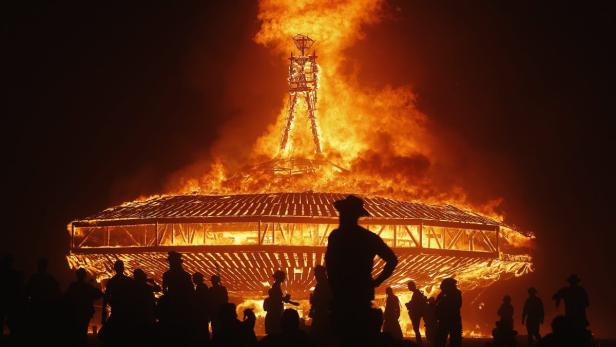 The Man burns during the Burning Man 2013 arts and music festival in the Black Rock Desert of Nevada, August 31, 2013. The federal government issued a permit for 68,000 people from all over the world to gather at the sold out festival, which is celebrating its 27th year, to spend a week in the remote desert cut off from much of the outside world to experience art, music and the unique community that develops. REUTERS/Jim Urquhart (UNITED STATES - Tags: SOCIETY TPX IMAGES OF THE DAY) FOR USE WITH BURNING MAN RELATED REPORTING ONLY. FOR EDITORIAL USE ONLY. NOT FOR SALE FOR MARKETING OR ADVERTISING CAMPAIGNS. NO THIRD PARTY SALES. NOT FOR USE BY REUTERS THIRD PARTY DISTRIBUTORS