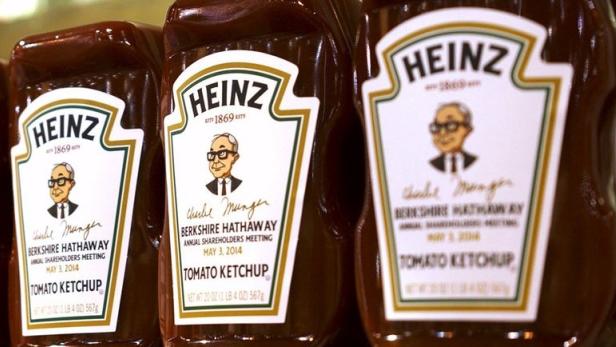 Warren Buffett und seine rechte Hand Charlie Munger (Karikatur) sind längst Legenden, 2014 sorgte ihr Einstieg bei Heinz Ketchup für Furore.