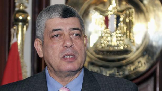 Egypt's newly appointed Interior Minister Mohamed Ibrahim speaks to media at his office in Cairo January 5, 2013. Thousands of supporters of deposed Egyptian President Mohamed Mursi demonstrated outside the prime minister's office on July 17, 2013 in a "day of steadfastness" to protest against the formation of a new interim cabinet on its first day on the job. Picture taken January 5, 2013. REUTERS/El-Youm el-Sabaa Newspaper (EGYPT - Tags: POLITICS)