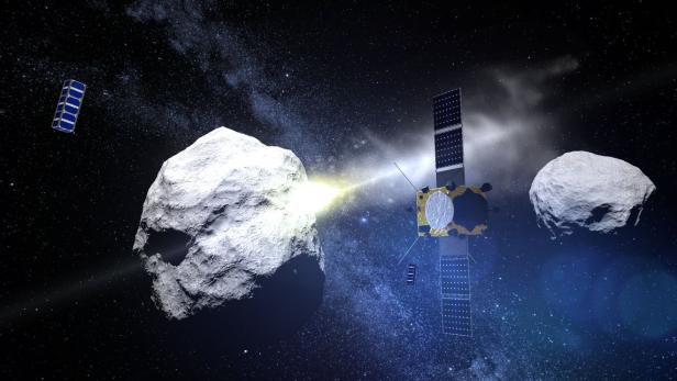 Die ESA-Sonde beobachtet wie das NASA Geschoss in den Asteroidenmond einschlägt.
