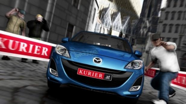 Ein blauer Mazda mit „Kurier“-Kennzeichen auf einer städtischen Straße.