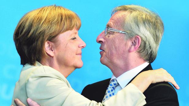 Kanzlerin Angela Merkel und Jean-Claude Juncker, der vermutlich nächste Kommissionspräsident.