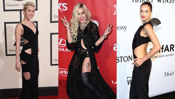 Drei Frauen in schwarzen Kleidern posieren auf dem roten Teppich.