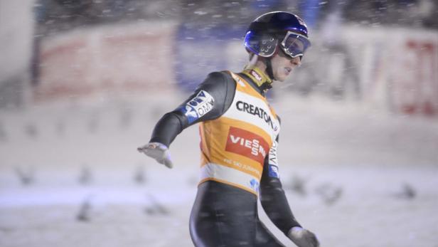 Austria&#039;s Gregor Schlierenzauer reacts after his second jump in the FIS Ski Jumping World Cup Large Hill competition in Kuopio, March 12, 2013. Schlierenzauer placed fifth in the competition and secured the World Cup overall victory. REUTERS/Martti Kainulainen/Lehtikuva (FINLAND - Tags: SPORT SKIING) ATTENTION EDITORS - THIS IMAGE HAS BEEN SUPPLIED BY A THIRD PARTY. IT IS DISTRIBUTED, EXACTLY AS RECEIVED BY REUTERS, AS A SERVICE TO CLIENTS. FINLAND OUT. NO COMMERCIAL OR EDITORIAL SALES IN FINLAND. NO THIRD PARTY SALES. NOT FOR USE BY REUTERS THIRD PARTY DISTRIBUTORS