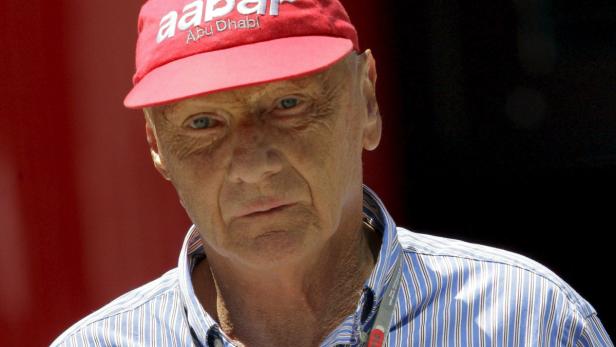 epa03278414 Austrian former Formula One world champion Niki Lauda walks in the paddock during the qualifying session held at the urban circuit of Valencia, eastern Spain, 23 June 2012. Formula One Grand Prix of Europe will take place on 24 June. EPA/KAI FOERSTERLING
