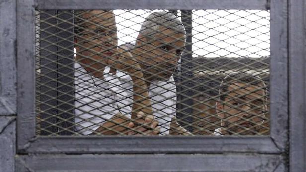 Li-re: Al-Jazeera-Journalisten Peter Greste, Mohammed Fahmy und Baher Mohamed