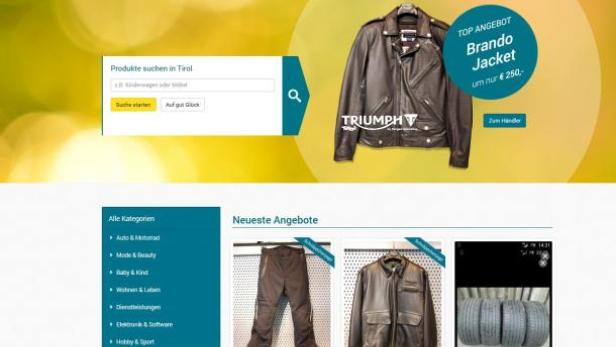 Die Webseite meins.at mit Angeboten wie einer Triumph-Lederjacke und Motorradbekleidung.