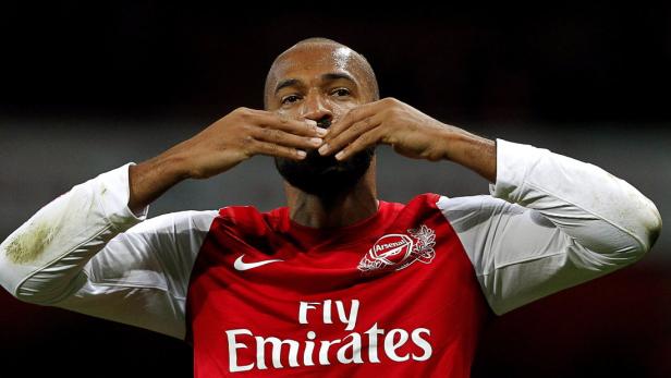epa03054869 Arsenal&#039;s Thierry Henry celebrates after their English FA Cup soccer match against Leeds United at Emirates Stadium in London, Britain, on 09 January 2012. EPA/KERIM OKTEN DataCo terms and conditions apply. http//www.epa.eu/downloads/DataCo-TCs.pdf
