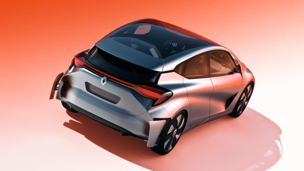 Ein silberfarbenes Renault EOLAB Konzeptfahrzeug vor einem orangefarbenen Hintergrund.