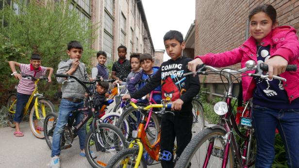 Ein Königreich für ein Fahrrad: Kinder im Flüchtlingsquartier bei mir ums Eck