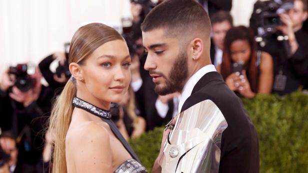 Model Gigi Hadid (L) and singer Zayn Malik arrive at the Metropolitan Museum of Art Costume Institute Gala (Met Gala) to celebrate the opening of &quot;Manus x Machina: Fashion in an Age of Technology&quot; in theManhattan borough of New York, May 2, 2016. REUTERS/Eduardo Munoz TPX IMAGES OF THE DAY