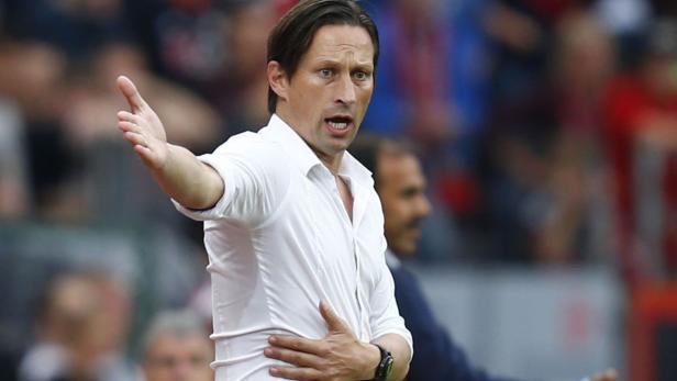 Bayer Leverkusen's coach Roger Schmidt reacts duri