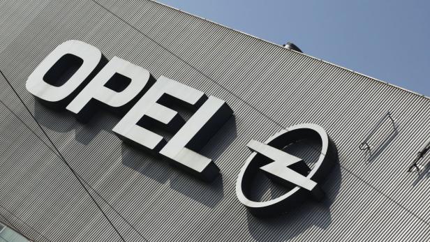 A logo of Opel is pictured at the Opel plant in Bochum March 23, 2012. After more than four years of falling demand and profits, Europe&#039;s carmakers have yet to restructure or consolidate. Many factories are running at partial capacity - analysts estimate automakers have cut some 3 million cars, or 20 percent, from their production lines - and still producers struggle to sell their wares. For one, General Motors lost $747 million on its European operations last year, and has lost money in Europe for 12 straight years. The company&#039;s Opel plant in Bochum, Germany, though, remains a candidate for closure, although the company has promised unions it won&#039;t close any Opel plants until after 2014. Picture taken March 23, 2012. To match Insight EUROPE/CARS-OVERCAPACITY REUTERS/Ina Fassbender/Files (GERMANY - Tags: TRANSPORT BUSINESS LOGO INDUSTRIAL)