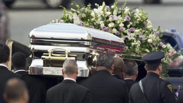 REUTERSPall-bearers carry the casket of pop singer Whitney Houston to a hearse following her funeral service at the New Hope Baptist Church in Newark, New Jersey February 18, 2012. Houston, 48, died in a Beverly Hills hotel room on February 11, the eve o