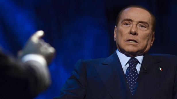 epa03516974 Former Italian prime minister and leader of &#039;Popolo della Liberta&#039; (People of freedom) centre-right party, Silvio Berlusconi, speaks during the Raiuno TV program &#039;Domenica In&#039;, conducted by Massimo Giletti in Rome, Italy, 23 December 2012. Berlusconi earlier in December announced plans to run again for premier in the elections due in 2013, setting off alarm bells on financial markets and EU in Brussels. Berlusconi left office in 2011 amid a flurry of legal investigations and a struggling economy, handing the reins to technocratic Prime Minister Mario Monti. EPA/GUIDO MONTANI
