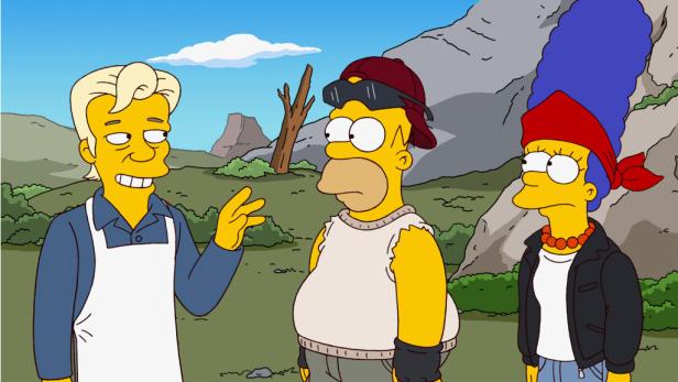 dapdIn this image released by Fox, series regulars Marge Simpson, right, and Homer Simpson, center, are shown with their new neighbor, WikiLeaks founder Julian Assange, in an episode of "The Simpsons." Assange lends his voice to the character for the mil 500. Folge: Simpsons als Ausgestoßene