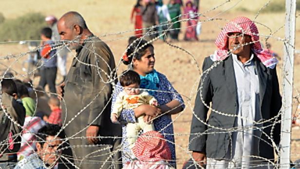 Syrische Flüchtlinge an der Grenze zur Türkei
