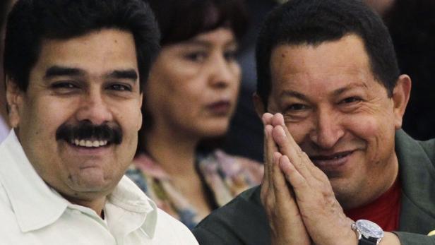 Venezuela&#039;s President Hugo Chavez (R) gestures next to Foreign Minister Nicolas Maduro at the World People&#039;s Conference on Climate Change and the Rights of Mother Earth in Tiquipaya on the outskirts of Cochabamba in this April 22, 2010 file photo. After rising from bus driver to union leader to vice president Maduro could soon be at the helm of the South American OPEC nation if a third bout of cancer pulls Chavez out of office. Anointed as the former soldier&#039;s successor, Maduro is the most popular of Chavez&#039;s inner circle and the most qualified to carry on his oil-financed socialism. REUTERS/David Mercado/Files (VENEZUELA - Tags: POLITICS HEALTH)