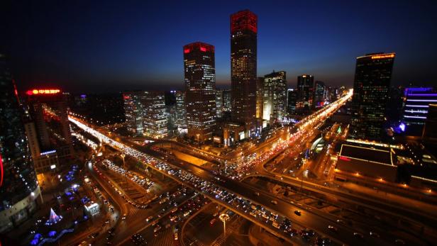 File photo of vehicles on Three Ring Road and Jian Rush Hour in Peking: Verkehrsströme, Warenströme - alles wächst in den aufstrebenden Mächten Asiens.